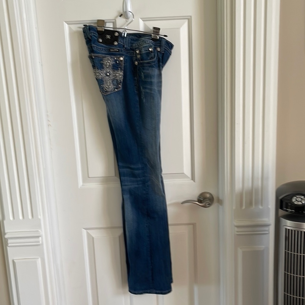 Miss me jeans.  Medium washed.  Embellished.  High quality Jean.